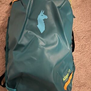 Cotopaxi Allpa 28L Backpack in Teal and Orange